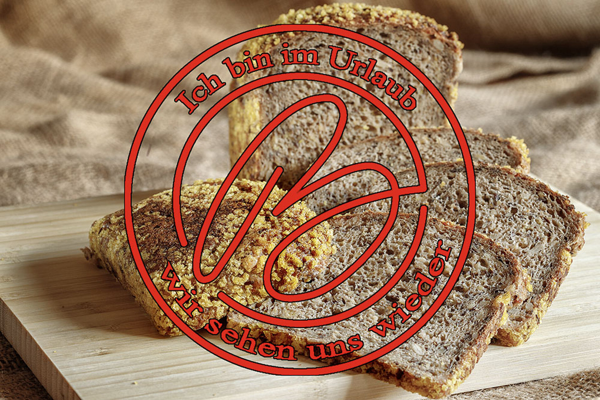 Dinkel Eiweißbrot mit rotem Stempel "ich bin im Urlaub"