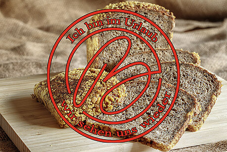 Dinkel Eiweißbrot mit rotem Stempel "ich bin im Urlaub"